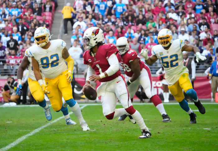 Nov 27, 2022; Glendale, AZ, USA; Arizona Cardinals quarterback Kyler Murray (1) scrambles away from Los Angeles Chargers defensive end Joe Gaziano (92) and linebacker Khalil Mack (52) during the second quarter at State Farm Stadium.